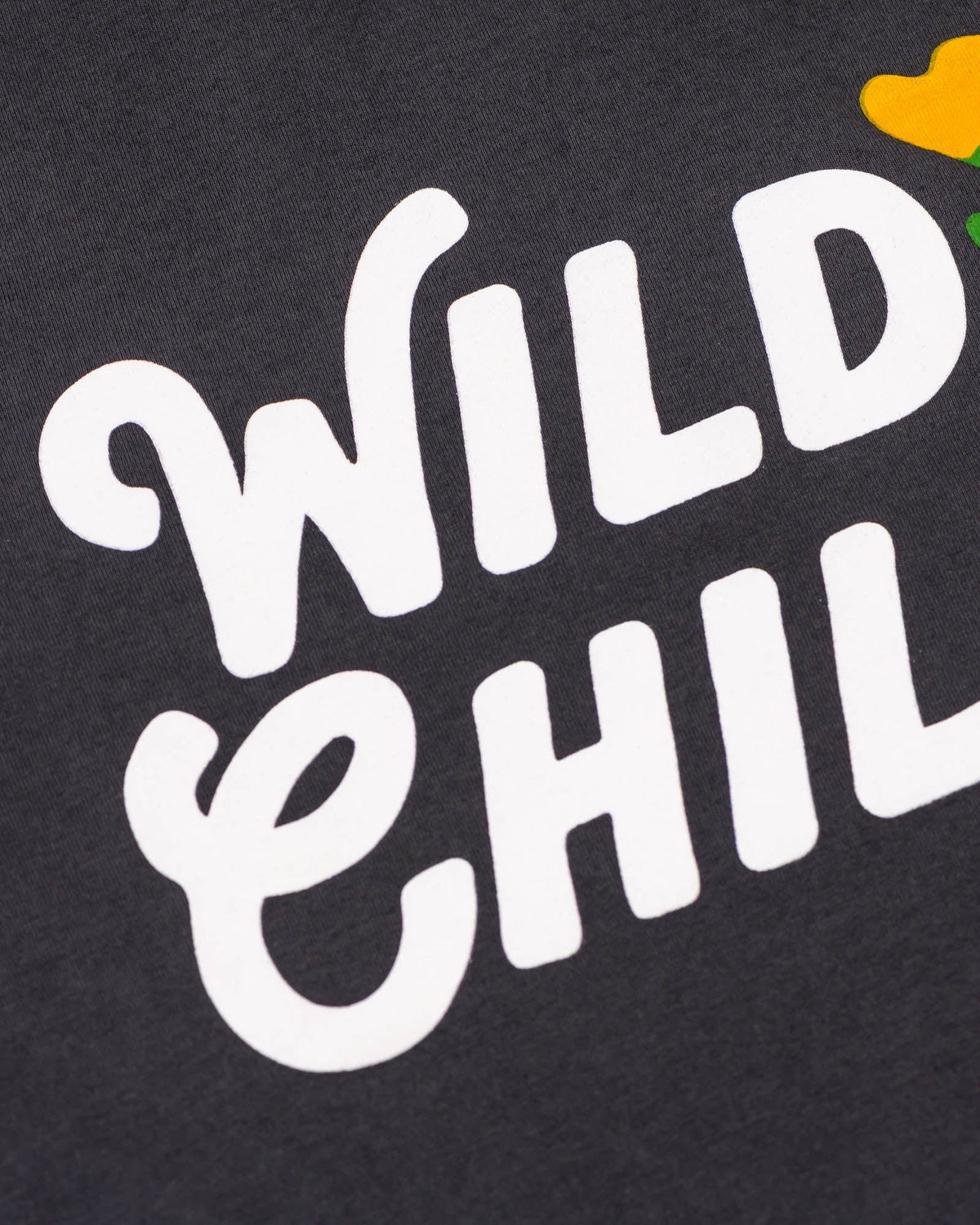 Wild Child Unisex Tee Coal – side view | Metro Variety Shop